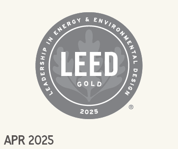 A gray circular LEED Gold medallion logo with an oak leaf in the center, labeled "Leadership in Energy & Environmental Design 2025." The date "APR 2025" appears below.